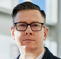 CEO Alexander Hughes, executive at a crypto trading company, portrait